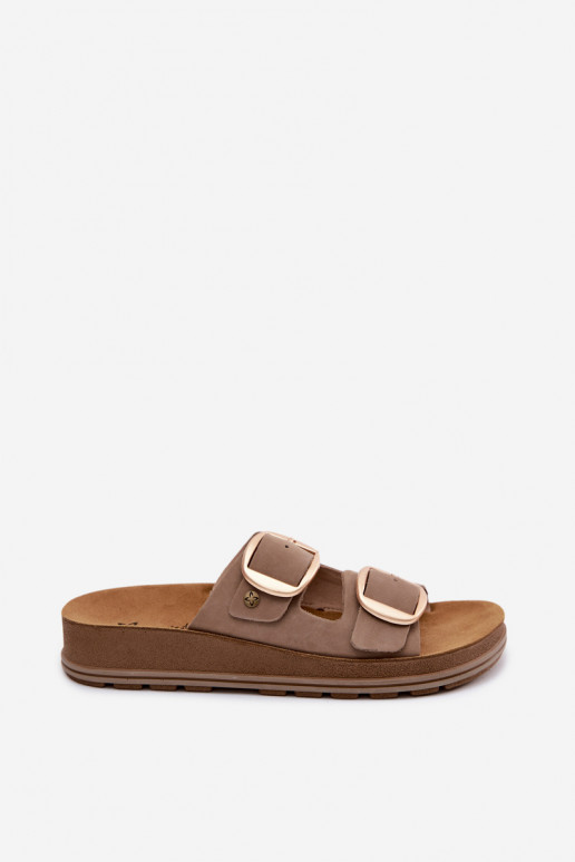 Leren slippers met gespen in zandkleur