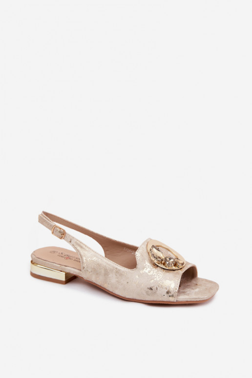 Flache Sandalen für Frauen mit Ornamenten in Goldfarbe