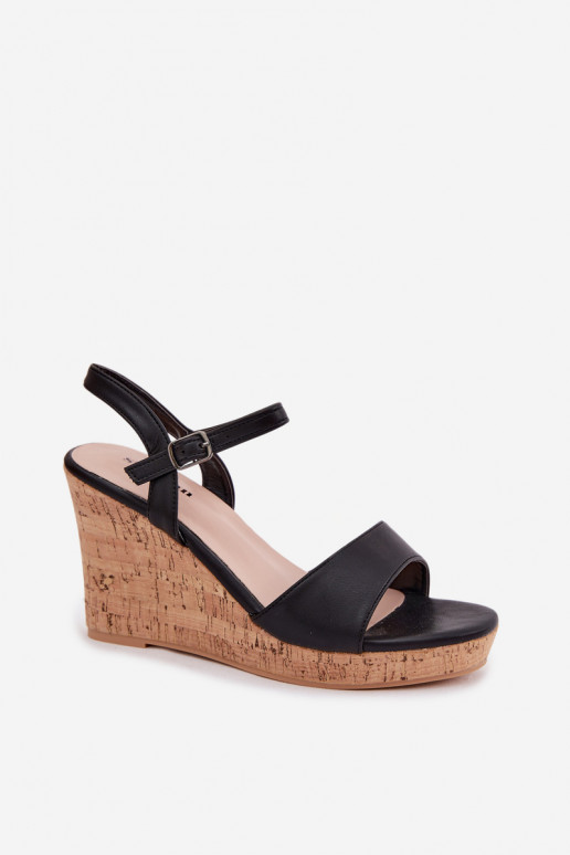 Damensandalen mit einer Plattform schZuarze Farbe Clarabella