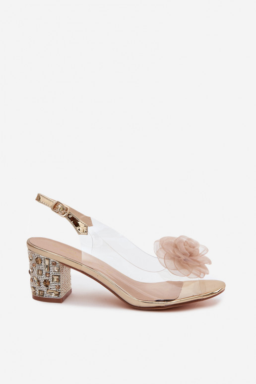 Goldene transparente Sandalen mit Absätzen und funkelnden Nieten D&A