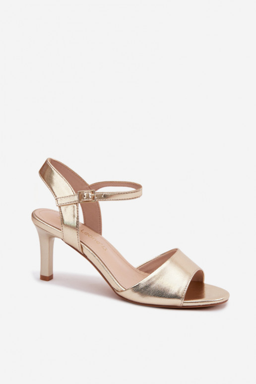 Sandales pour femmes sur un talon fin couleur or par Sergio Leone
