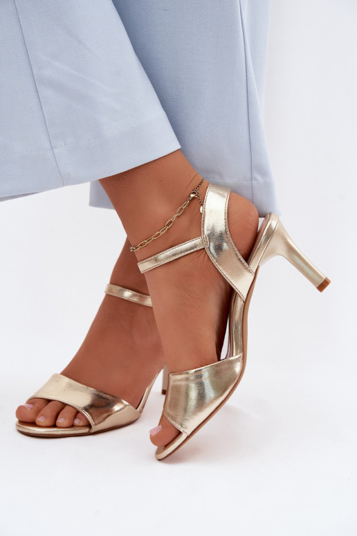 Damen Sandalen auf einem dünnen Absatz in goldfarben von Sergio Leone