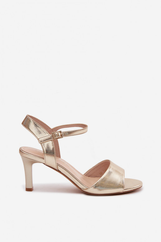 Sandales pour femmes sur un talon fin couleur or par Sergio Leone
