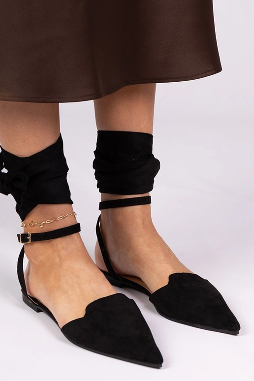 Schwarze Mules mit flachem Absatz Mella