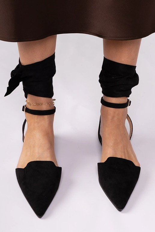 Schwarze Mules mit flachem Absatz Mella