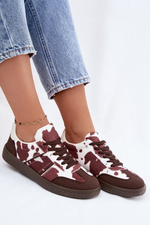 Sneaker mit Patches in Braun Corelle