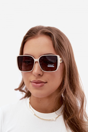 Lunettes de soleil avec des détails décoratifs en couleur sable