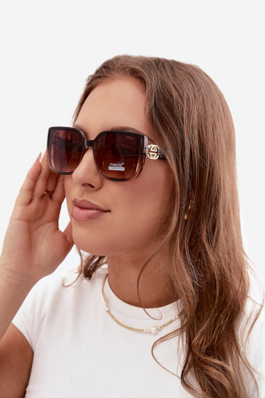 Lunettes de soleil avec des détails décoratifs en couleur marron