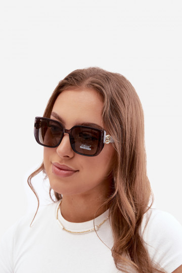 Sonnenbrille mit dekorativen Details in Grau