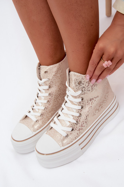 Gouden dames casual enkellaarsjes op een platform INildrose