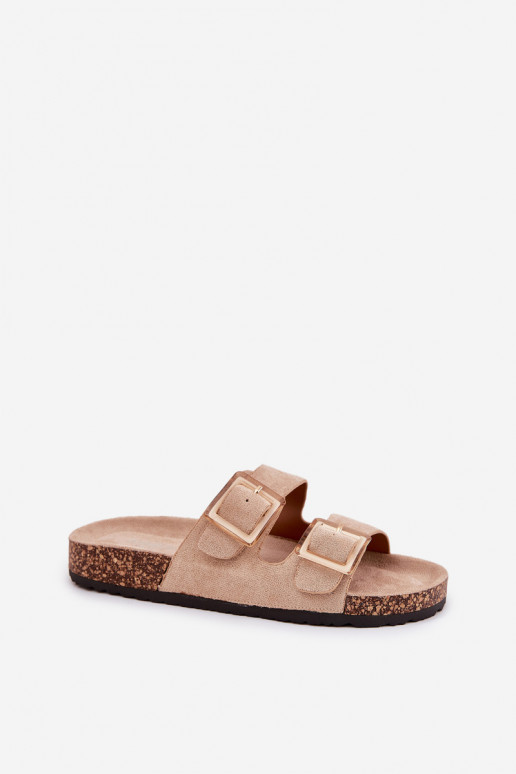 Dames slippers met gespen op een kurken zool in zand met hartjes