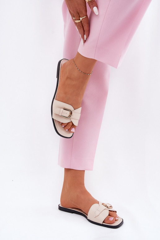 Dames slippers met platte zolen en gouden gespen in zand Esiobb