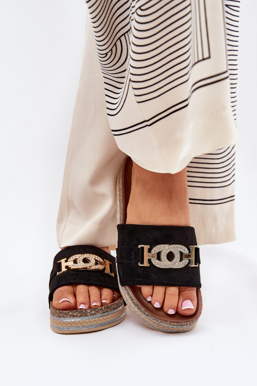 Dames slippers met details op een platform met glans in zwart Eanes