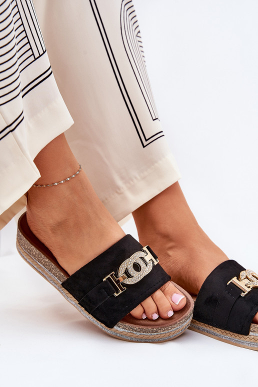 Chaussons pour femmes avec détails sur plateforme brillants en noir Eanes