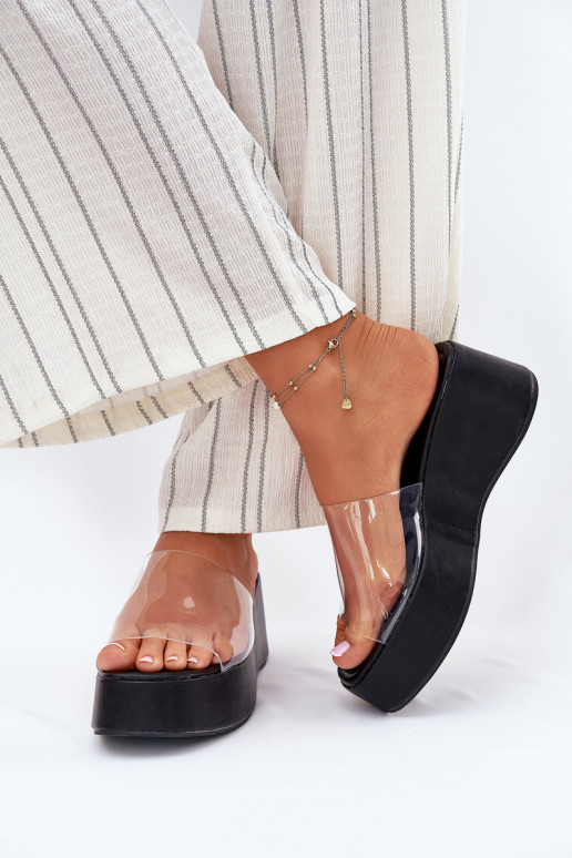 Chaussons pour femmes noires avec des lanières transparentes sur la plateforme Meltiana