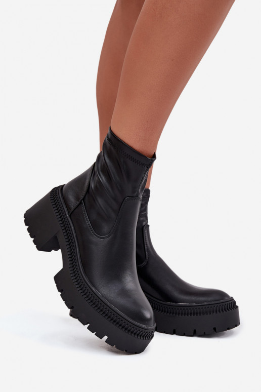 Damen Stiefeletten auf massiven Absätzen und Plattform aus schwarzem Kunstleder Elvianne