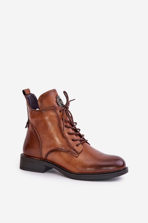 Bottines brunes isolées avec de larges talons ornés Leonise