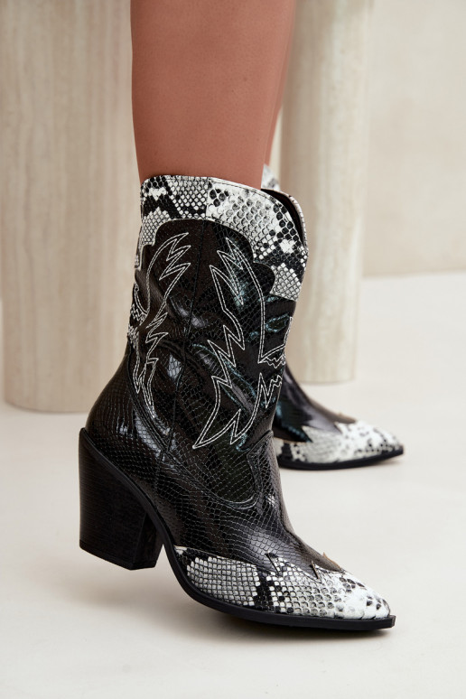 bottines cowboy en fausse fourrure avec motif en relief en noir et blanc Ambery