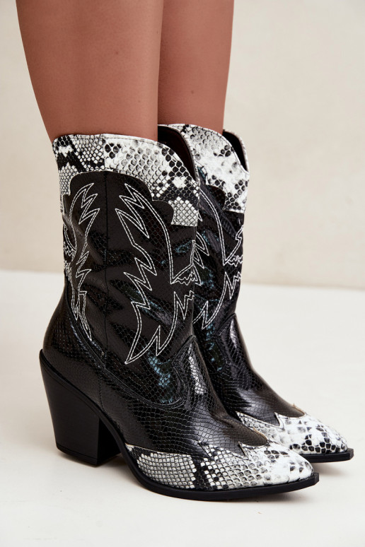 bottines cowboy en fausse fourrure avec motif en relief en noir et blanc Ambery