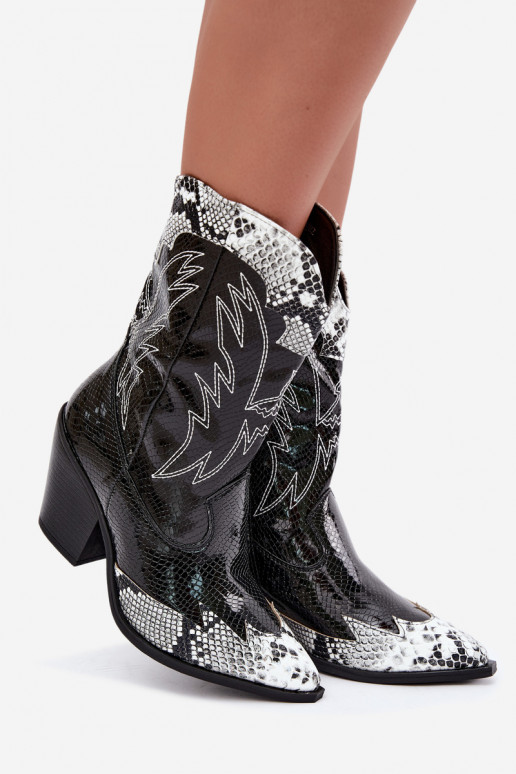 bottines cowboy en fausse fourrure avec motif en relief en noir et blanc Ambery