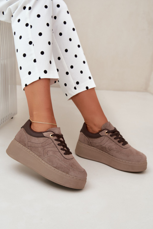 sneakers met platform in zand Tai turivra