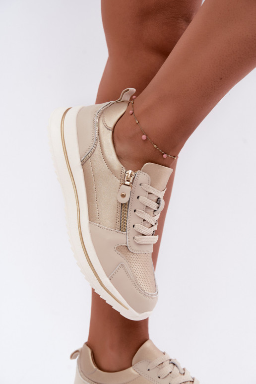 Oselia leren sneakers met decoratieve rits in goud-beige