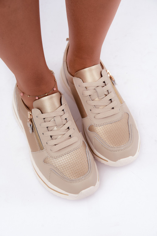 Oselia leren sneakers met decoratieve rits in goud-beige