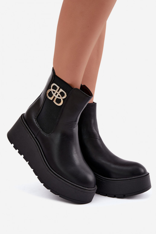Warme stijlvolle enkellaarsjes met platform en decoratieve details in zwart Solavie