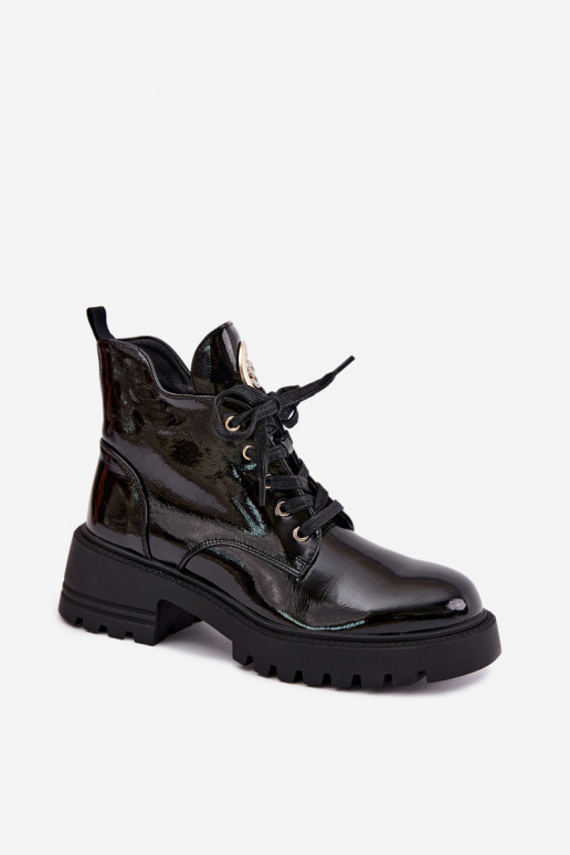 Wärmende Stiefeletten mit Lackeffekt und goldenen Details in Schwarz Kavirae