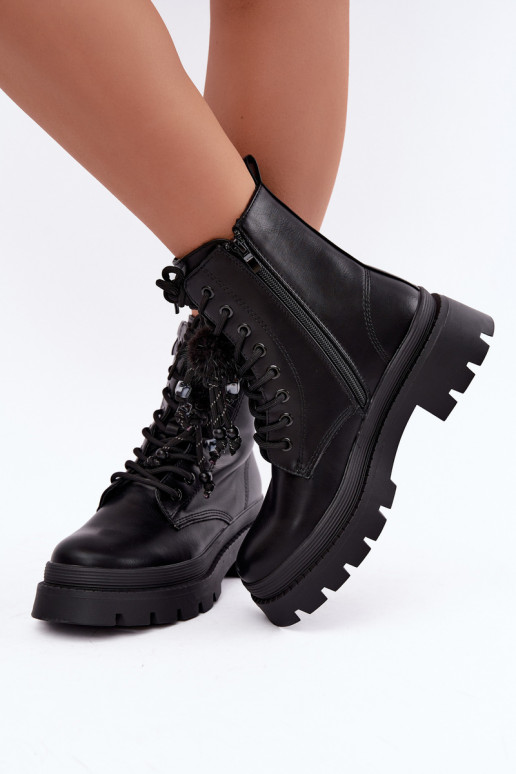 gefütterte Stiefel mit flauschigen Pompons in Schwarz Faresse