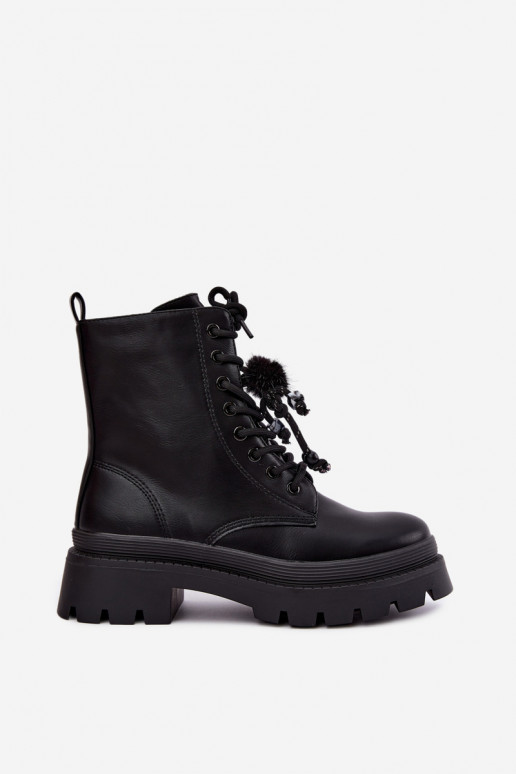 bottes isolées avec pompons en noir Faresse
