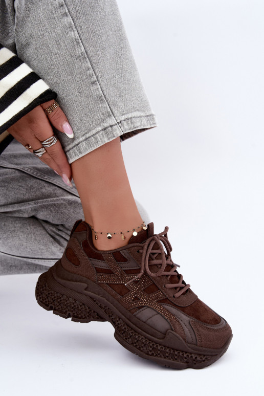 Sneakers met chocoladekleurige decoratie Amselle
