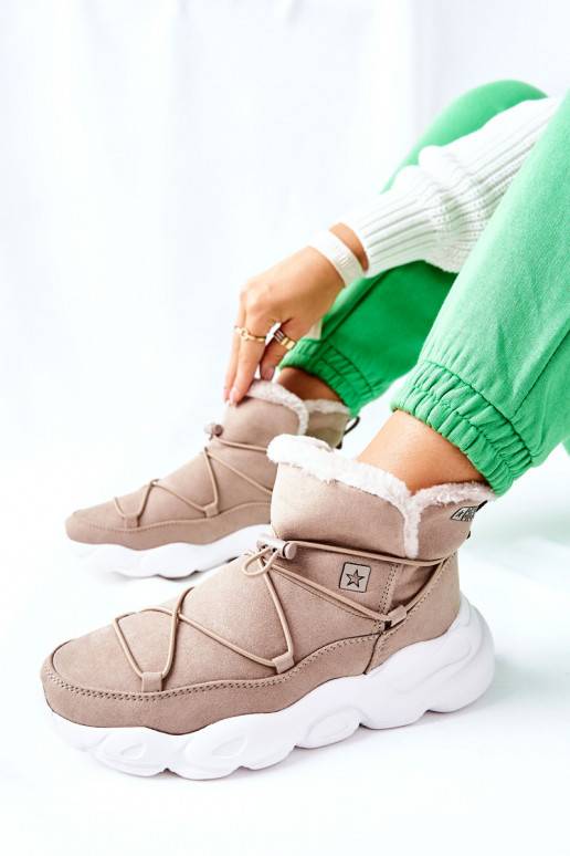 Bottes de neige chauffantes de couleur beige