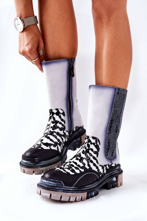 Bottes élégantes noires et blanches