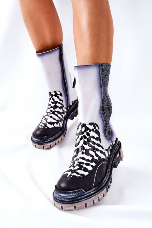 Bottes élégantes noires et blanches