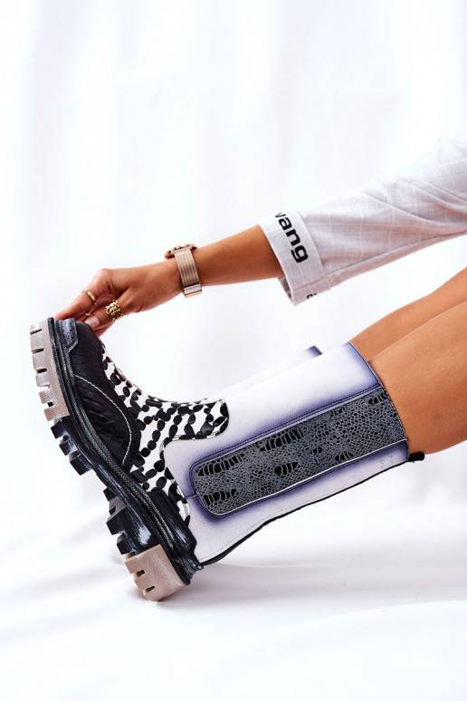 Bottes élégantes noires et blanches