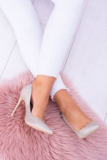 Chaussures à talons hauts brillantes de couleur dorée
