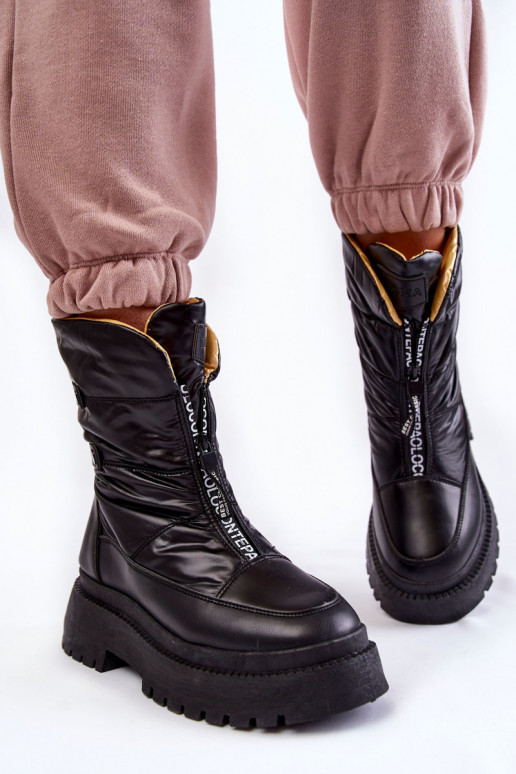 Schwarze Schneestiefel mit... Schwarze Schneestiefel mit...