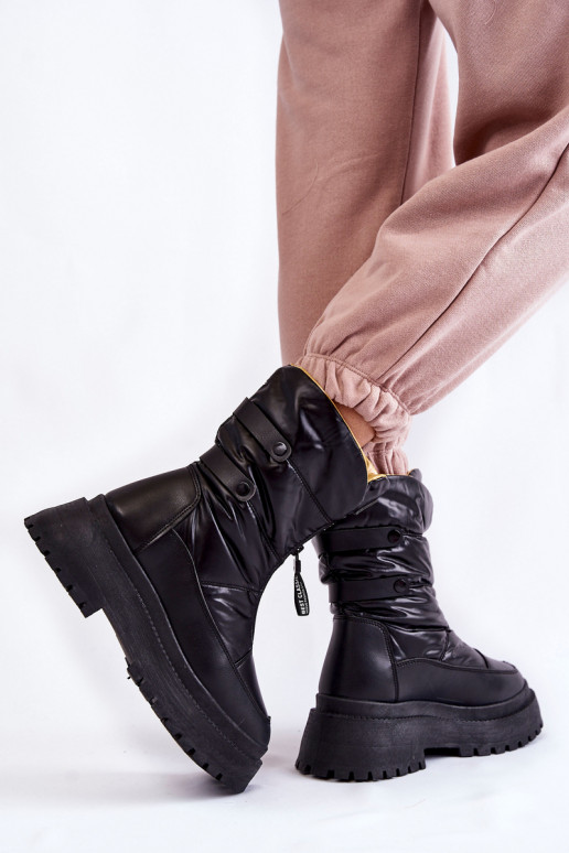Schwarze Schneestiefel mit... Schwarze Schneestiefel mit...