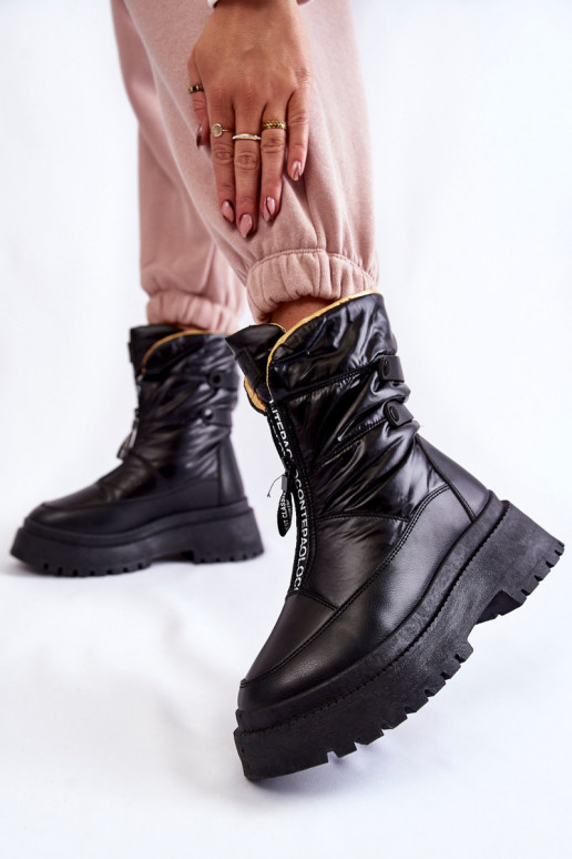 Schwarze Schneestiefel mit... Schwarze Schneestiefel mit...