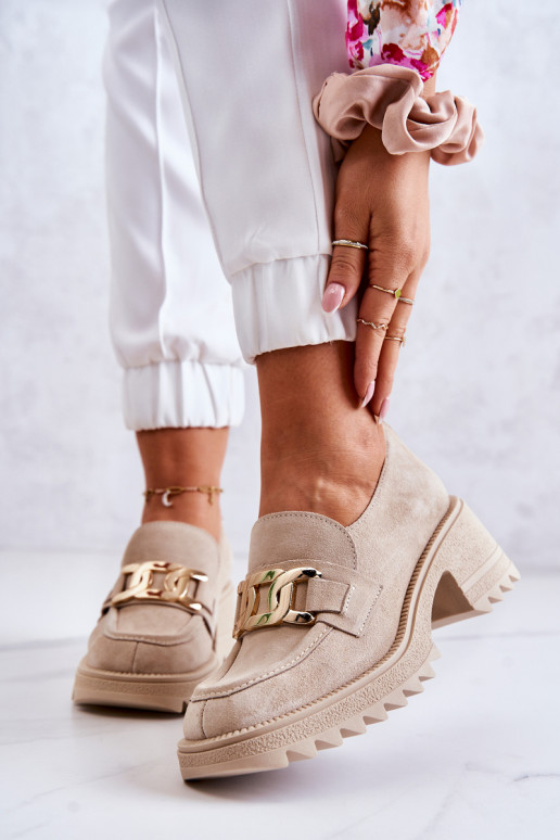 Elfenbeinfarbene Wildlederstiefel mit... Elfenbeinfarbene Wildlederstiefel mit...