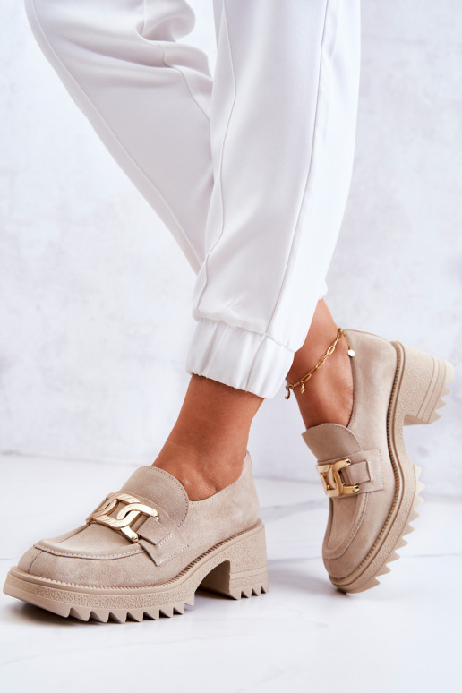 Elfenbeinfarbene Wildlederstiefel mit... Elfenbeinfarbene Wildlederstiefel mit...