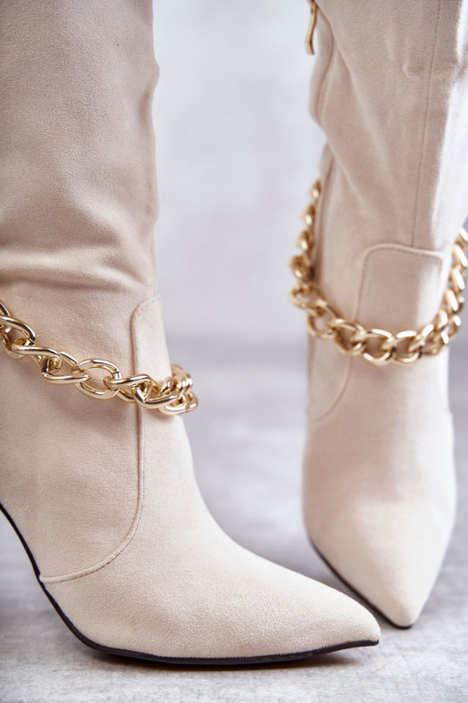 Bottines chauffantes à chaînes en ivoire Jasmin