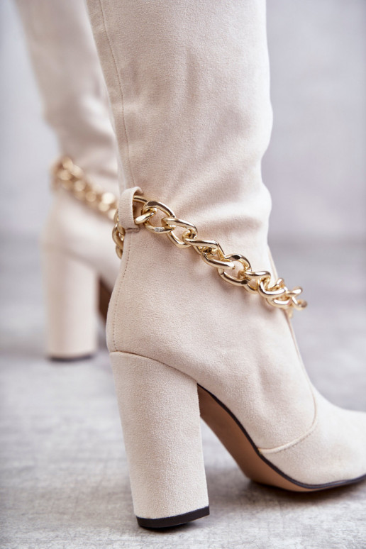Bottines chauffantes à chaînes en ivoire Jasmin