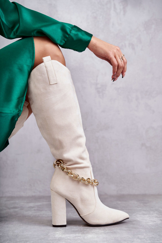 Bottines chauffantes à chaînes en... Bottines chauffantes à chaînes en...