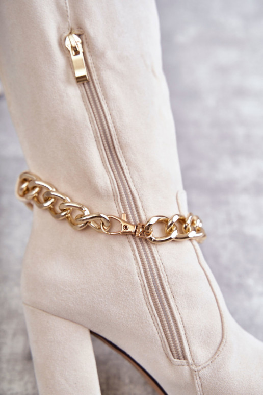 Bottines chauffantes à chaînes en ivoire Jasmin