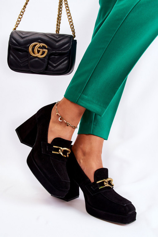 Bottines en daim noir par Laura Messi