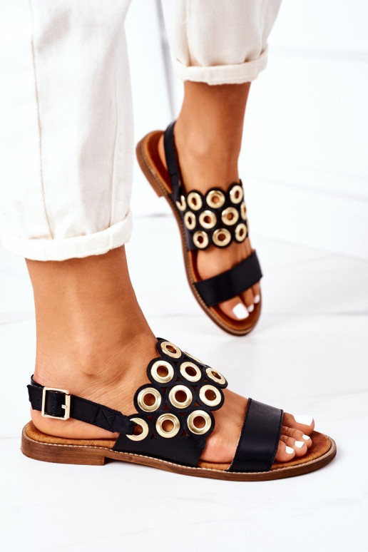 Schwarze, durchbrochene Sandalen. Schuhe für Damen