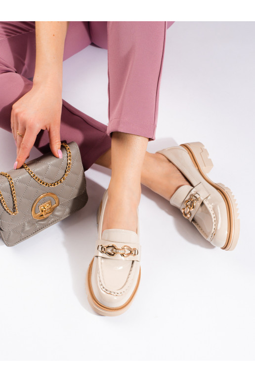 Bottines couleur sable avec détails...