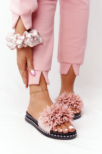 Roze rubberen pantoffels...